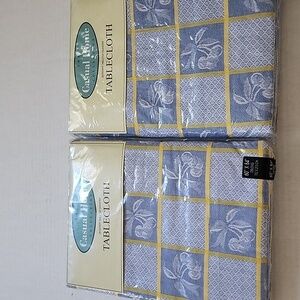 New blue and yellow tablecloths 60" x 84" in original packaging CASUAL HOME